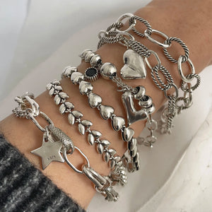Liens Bohèmes bracelets femme argentés cœurs étoiles maillons portés au poignet GoHappy France