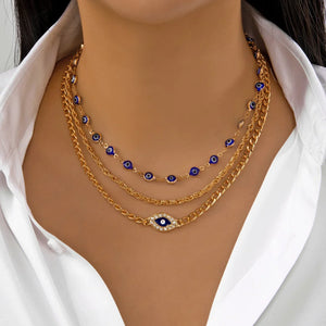 Colliers style bohème multirangs œil et croix - Colliers style bohème multirangs GoHappy