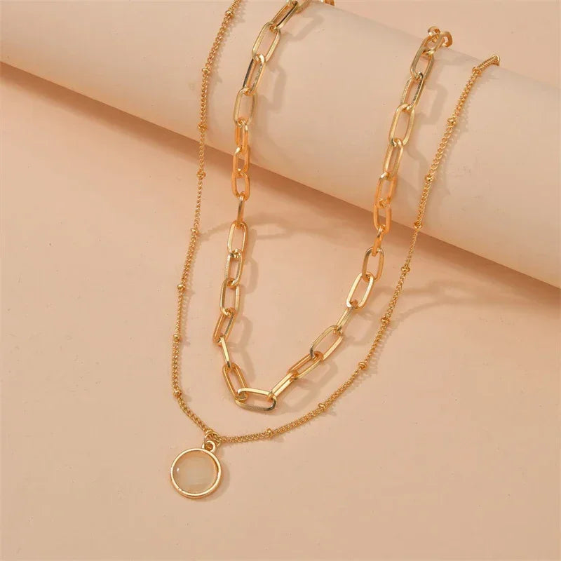 Colliers style bohème multirangs œil et croix - Colliers style bohème multirangs GoHappy