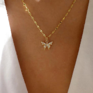 GoHappy France, collier femme Bohème Solaire Aster · Étoile dorée, alliage de zinc, composition portée au décolleté