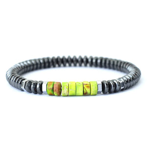 GoHappy France, bracelet unisexe Mineral Pulse Vert Lime, perles d’hématite anthracite, centre en pierre colorée, vue de face