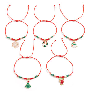 Cinq bracelets de Noël à cordons réglables présentés à plat