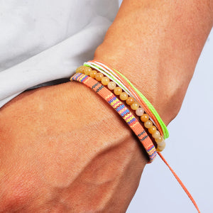 Nomad Trio Soleil Doré lot de trois bracelets tressés et perles