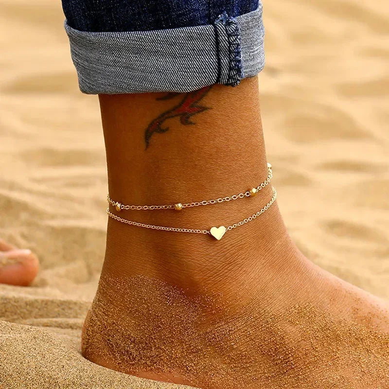 Bracelet de cheville chaîne fine argentée : Rempart - Retour de plage Bracelet de cheville chaîne fine argentée : Rempart - Retour de plage