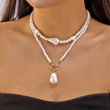 Colliers style bohème multirangs œil et croix