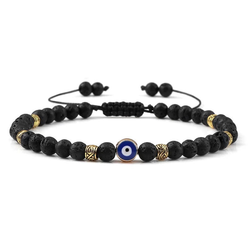 Bracelet Nazar Lave Noire dorée, perles fines et motif œil bleu | GoHappy France