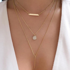 GoHappy France, collier femme Bohème Solaire Essentielle · Trio doré, alliage de zinc, composition portée au décolleté