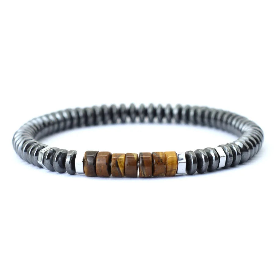 GoHappy France, bracelet unisexe Mineral Pulse Miel Tigré, perles d’hématite anthracite, centre en pierre colorée, vue de face