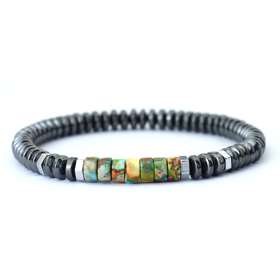 GoHappy France, bracelet unisexe Mineral Pulse Terre Mosaïque, perles d’hématite anthracite, centre en pierre colorée, vue de face
